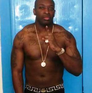 Drugs & guns: Gangster serving 27 years poses with Rolex watch & Versace bling in prison