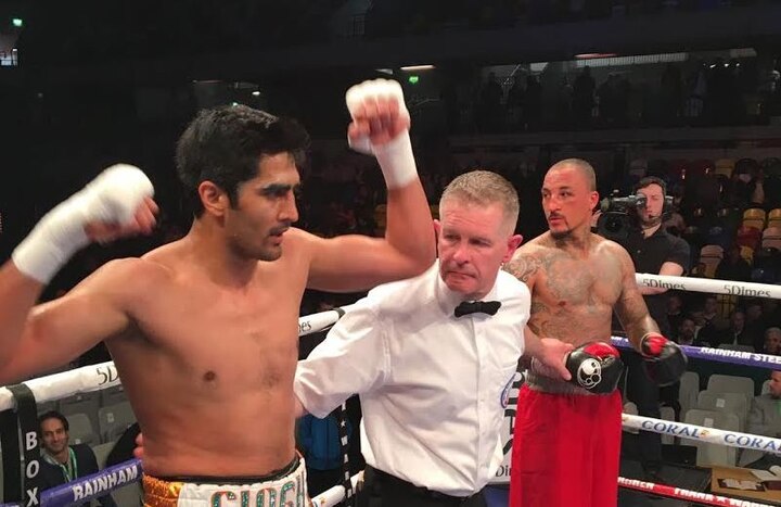 Vijender Singh knocks out another opponent, wins 5th consecutive bout Vijender Singh knocks out another opponent, wins 5th consecutive bout
