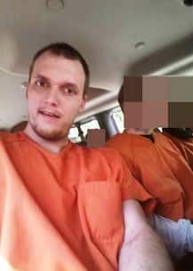 Shameless: Prisoner posts Facebook selfie from inside prison van as he is carried back to jail