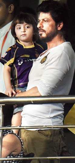 SRK attends KKR match with son, showers kisses on fans
