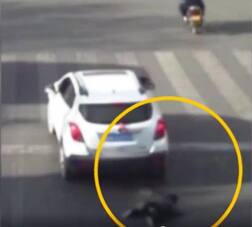 Viral video: Child luckily survives after falling from cab & being run over by SUV in China