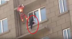Footage: BRAVE firefighter puts his own life at risk to save suicidal woman in China
