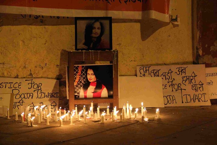 People light candles for Pooja Tiwari, demand CBI probe People light candles for Pooja Tiwari, demand CBI probe