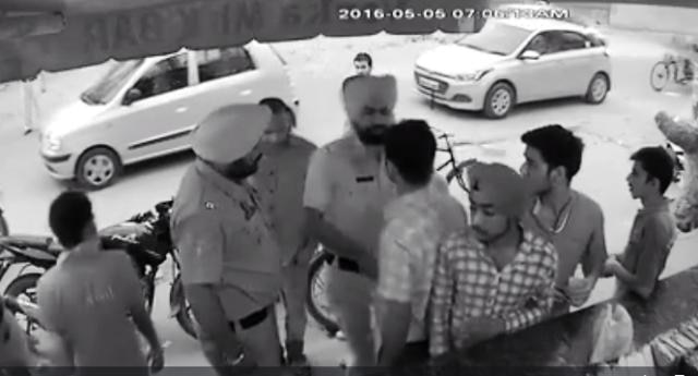 Watch: Punjab policemen caught on camera beating a youth for making their video Watch: Punjab policemen caught on camera beating a youth for making their video