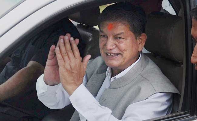 Uttarakhand showdown: Centre revokes President's Rule, Harish Rawat returns as Chief Minister Uttarakhand showdown: Centre revokes President's Rule, Harish Rawat returns as Chief Minister