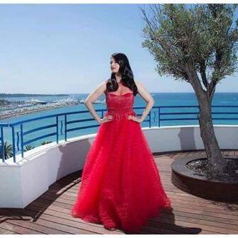 Mrs. Junior Bachchan looked ravishing in a red gown at the Cannes Press Conference.