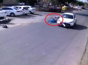 Video: Negligent riding costs women dearly as they collide with car on road crossing in Ahmedabad