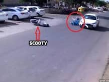 Video: Negligent riding costs women dearly as they collide with car on road crossing in Ahmedabad