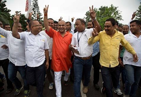 India's ruling Hindu nationalist has made dramatic gains in elections in the eastern state of Assam but trails in four other states that went to polls earlier this month. (Bharatiya Janata Party (BJP) candidate Himanta Biswa Sharma, center in orange color shirt, celebrates with his supporters after wining in Assam state election in Gauhati on May 19, 2016) (AP Photo/ Anupam Nath)
