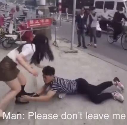 In the film, the man is seen lying on the ground and pulling hard his girlfriend’s stockings, begging the girl not to go.