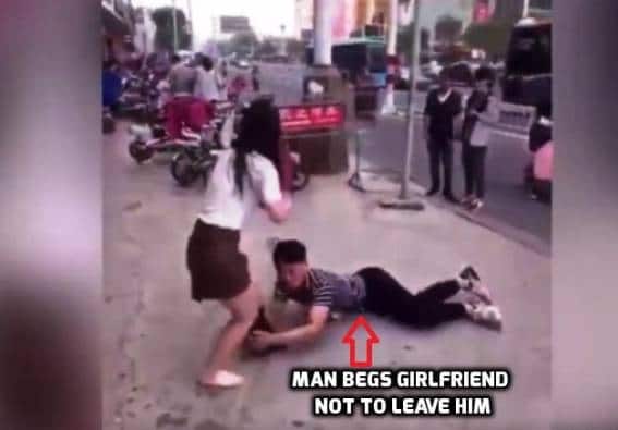 A footage of a man grabbing his girlfriend’s leg in a desperate bid to stop her leaving him has gone viral in Chinese media
