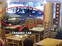 Terrifying: Watch moment when diners are hit as car breaks into restaurant