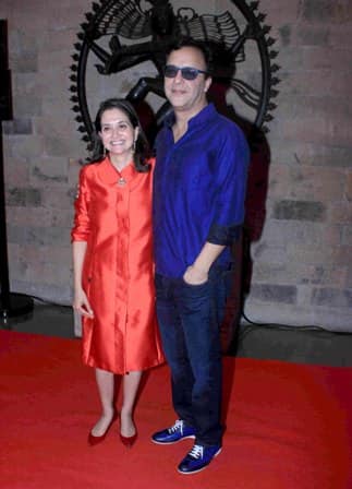 Filmmaker Vidhu Vinod Chopra with wife and film critic, Anupama Chopra.