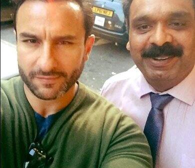 Saif with a fan.