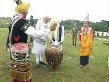 PM Modi tries his hands at drums in Meghalaya