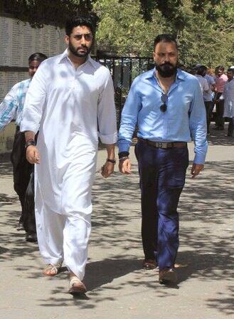 Abhishek Bachchan and filmmaker Bunty Walia during the funeral.