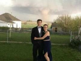 Perfect timing! These teens were getting ready for party when a powerful tornado clouded this picture! Perfect timing! These teens were getting ready for party when a powerful tornado clouded this picture!