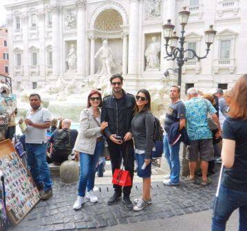 Sunny with her mother in law and husband.