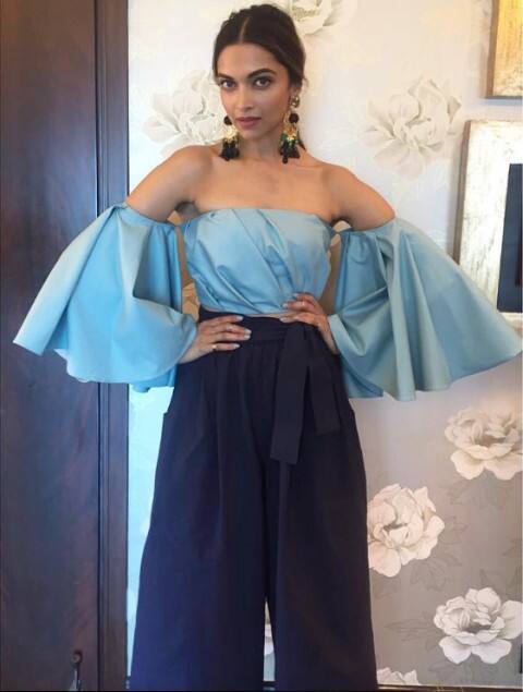 Bollywood actress was spotted at a Vogue eyewear event where she wore this sky blue off-shoulder top with Navy blue pants!