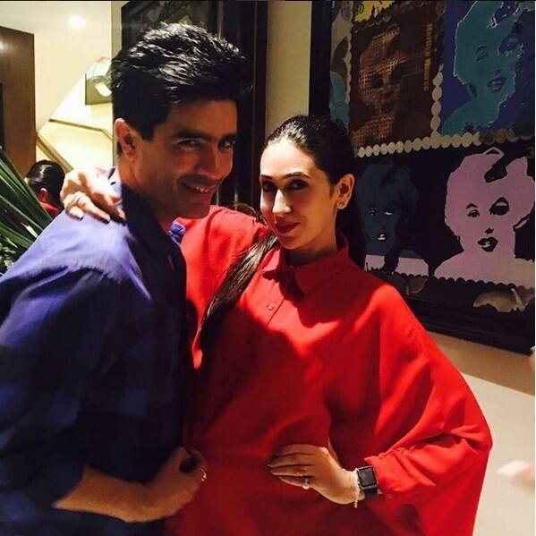 As always, Karisma was slaying in this long red hot shirt!