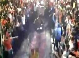 Shocking ritual! Watch devotees walk on burning coal to appease deity