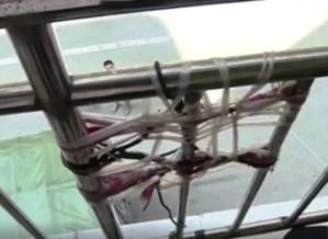 Watch what happens when 2-yr-old boy gets his head stuck between a pair of narrow window bars!