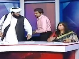 Watch: Pak lawmaker abuses woman activist on live TV debate, booked Watch: Pak lawmaker abuses woman activist on live TV debate, booked