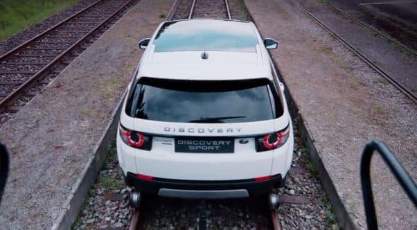 Car is weighted 2,500 kgs (2.5 ton) and it pulled 60times weight than its own. For that purpose, rail wheels were placed near car wheels