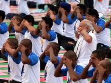 Yoga no religious activity, it's a global mass movement, says PM Narendra Modi