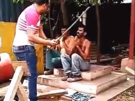 VIDEO: HR manager thrashes workers with iron rod for taking a nap in his cabin VIDEO: HR manager thrashes workers with iron rod for taking a nap in his cabin