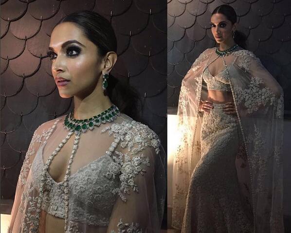The floral ornamentation and the netted cape gave the look an Indian feel. 