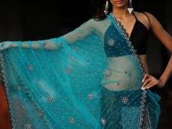 Judge orders husband to 'gift sari' to wife to strengthen their bond