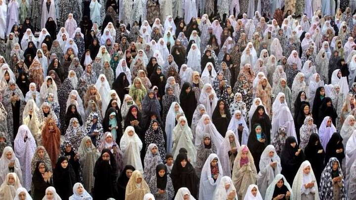 Iranian women attend Eid-al-Fitr prayers. (Source: AP)