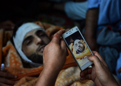 Over 20,000 attend Hizbul commander Burhan Muzaffar Wani's burial in Tral