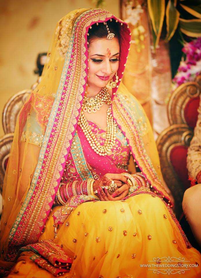 WOW! Mrs.Divyanka Dahiya we just can't get enough of you. All pictures : Instagram and The Wedding Story.