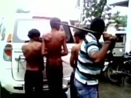 Watch: Cow protection vigilantes beat 4 men black & blue publically with iron rod Watch: Cow protection vigilantes beat 4 men black & blue publically with iron rod