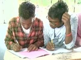 Watch: Jharkhand college students caught doing mass-cheating during exam Watch: Jharkhand college students caught doing mass-cheating during exam