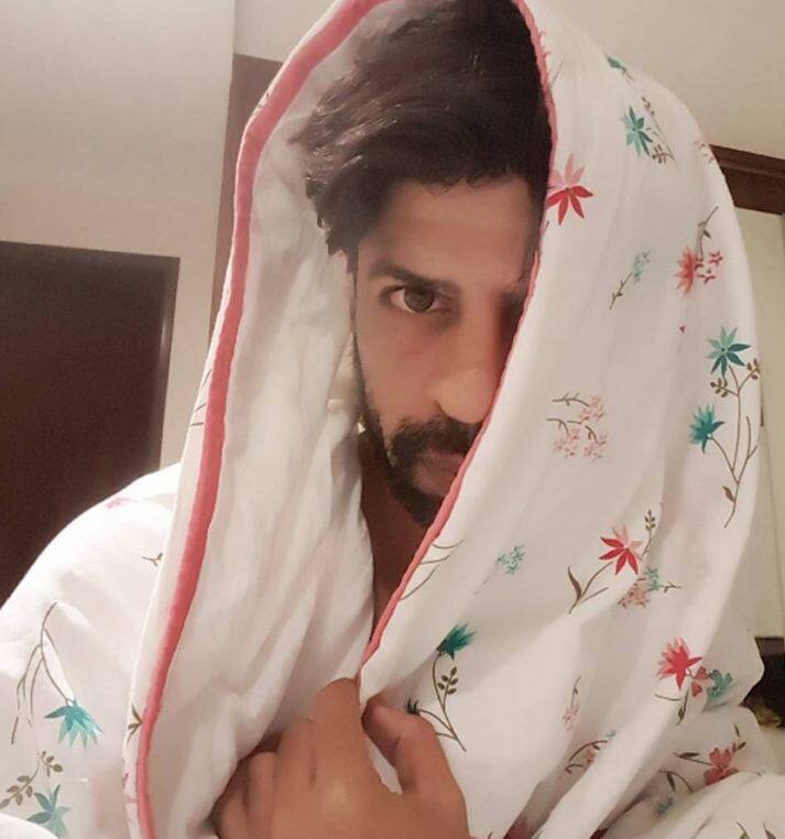 Take a look at some of his pictures and see how much he resembles King Khan.