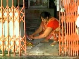 Temple authorities 'clean' premises with Gangajal after Dalit woman performs pooja Temple authorities 'clean' premises with Gangajal after Dalit woman performs pooja