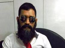 Recognising Dhoni in this picture with Ziva is a bit difficult