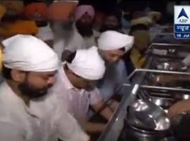 CM Kejriwal sparks a row, cleans already clean utensils in Golden Temple CM Kejriwal sparks a row, cleans already clean utensils in Golden Temple