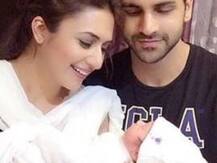 Divyanka and Vivek pose with a newborn baby!