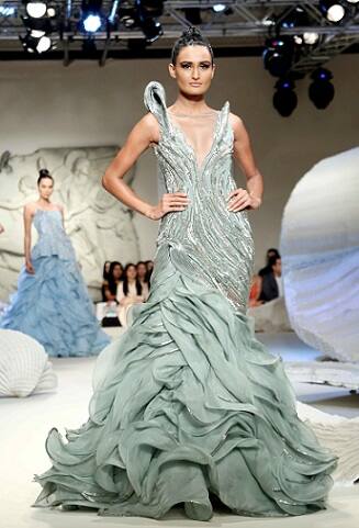 Model displaying an outfit by Gaurav Gupta 