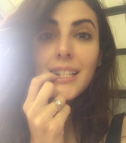 By posting her picture on Instagram she announced the engagement 