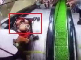 Watch: Careless mother drops her baby off the escalator Watch: Careless mother drops her baby off the escalator