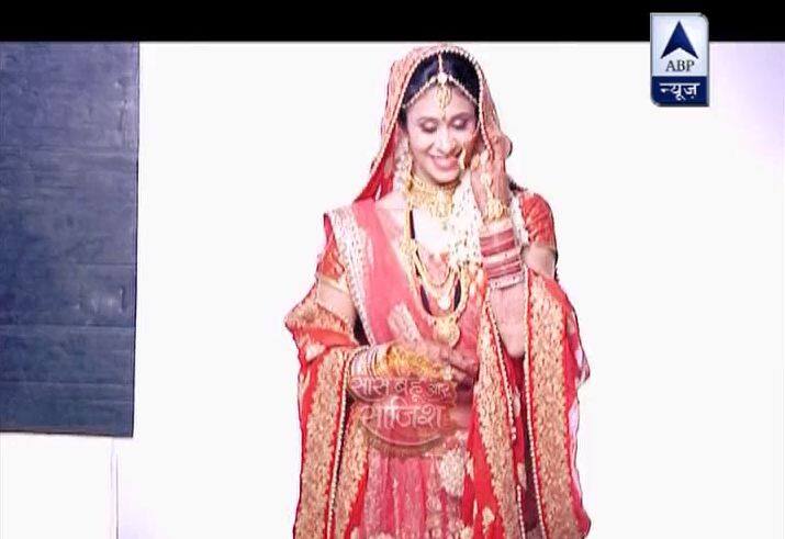 She looks amazing in this Bride dress!