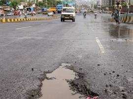 Delhi motorcyclist run over by tanker after falling into pothole Delhi motorcyclist run over by tanker after falling into pothole