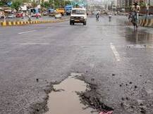 Delhi motorcyclist run over by tanker after falling into pothole