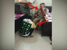 Viral video: Man goes to file FIR in Lucknow's police station, constable forces him for leg massage! Viral video: Man goes to file FIR in Lucknow's police station, constable forces him for leg massage!