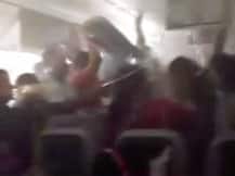 'Son, hold that laptop': How passengers risked their lives on Emirates plane